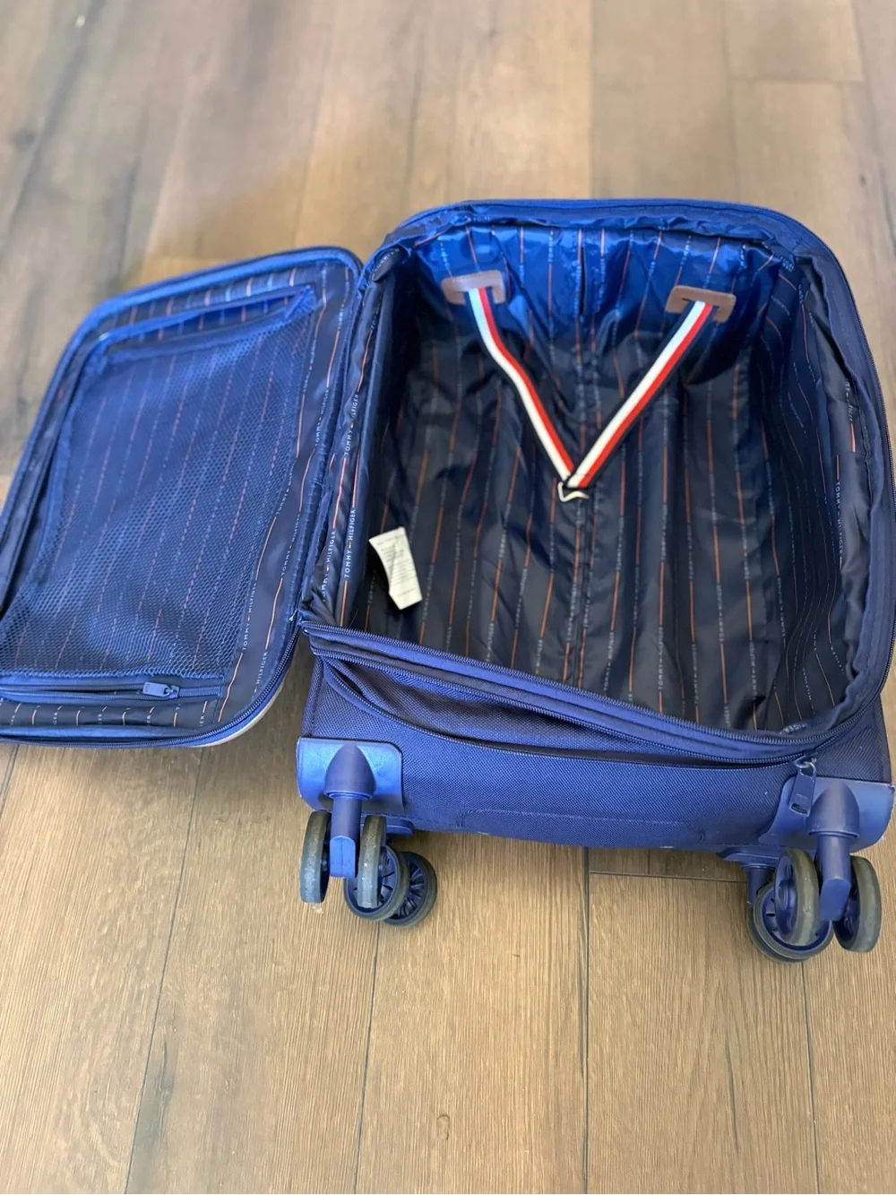 Tommy Hilfiger Navy Carry-On Suitcase with Brown Trim and Striped Pocket